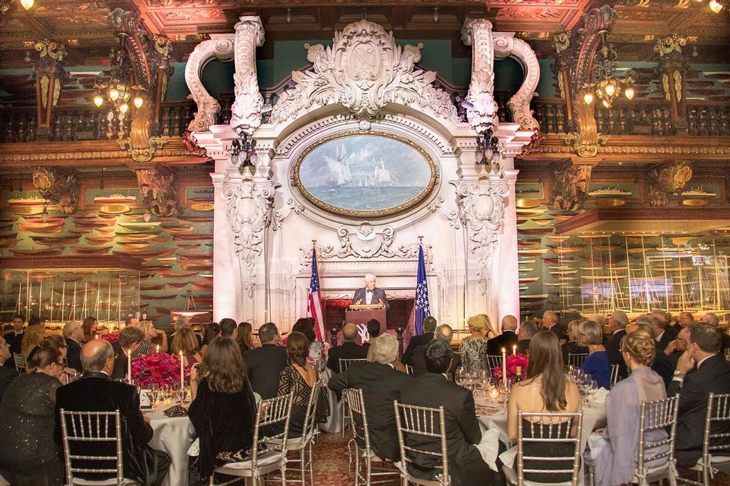 The 42-ton Caen stone fireplace and mantel, highlighted by Julius L. Stewart’s painting of the 1866 Transatlantic Race, dominates the Model Room - Hall of Fame induction for Ernesto Bertarelli Alinghi and Lord Dunraven © Carlo Borlenghi http://www.carloborlenghi.com